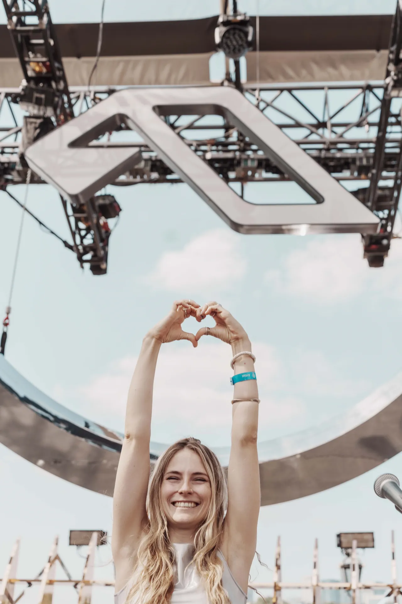 Musicians playing live at a concert, engaging with the audience and delivering an electrifying performance.